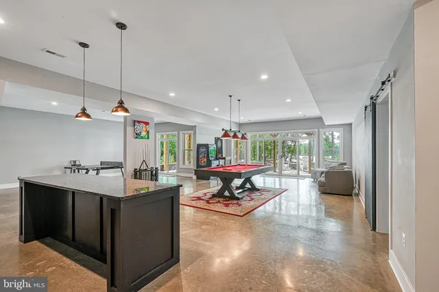a view of a chair and table in the balcony