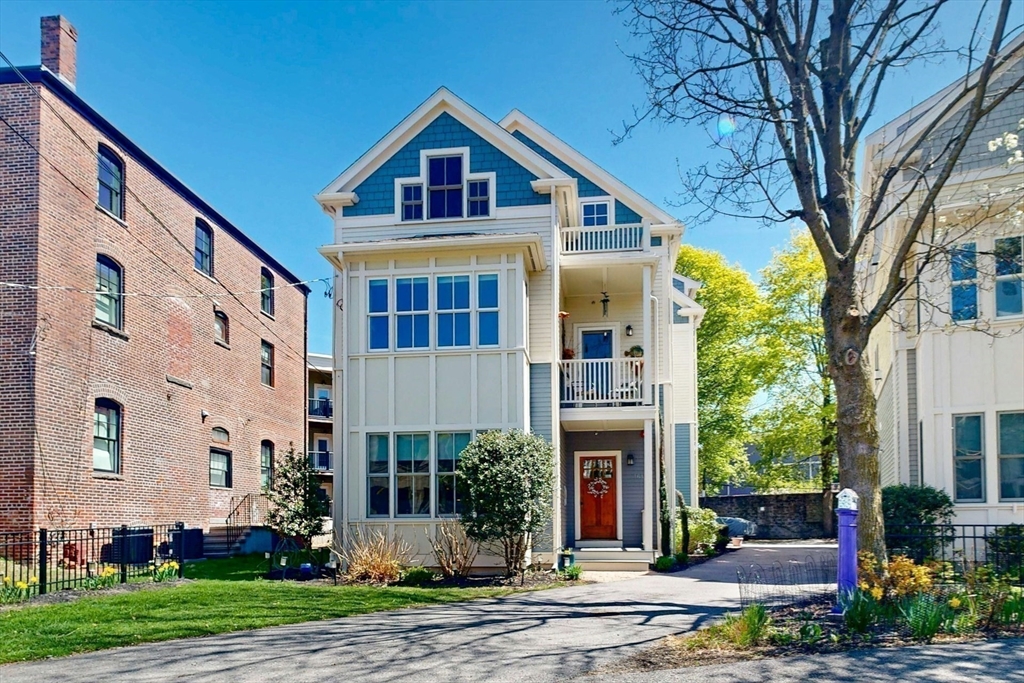 16 A Meehan Street, Unit 1 Boston, MA 02130 - Photo 1 of 16 a front view of a house with garden