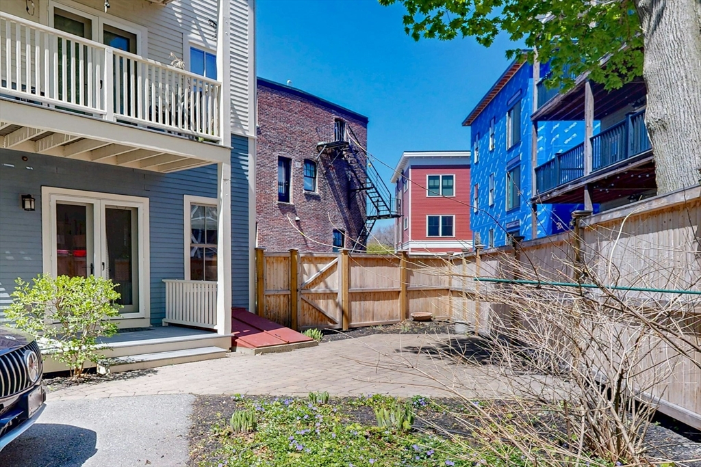 16 A Meehan Street, Unit 1 Boston, MA 02130 - Photo 16 of 16 a house on the side of a building