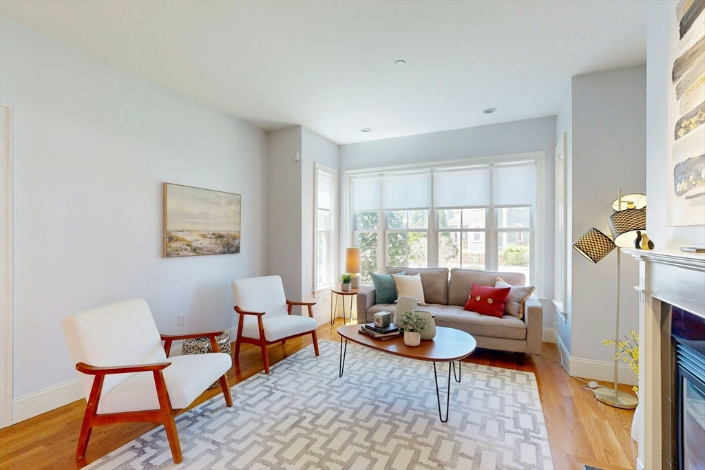 16 A Meehan Street, Unit 1 Boston, MA 02130 - Photo 3 of 16 a living room with furniture and a window