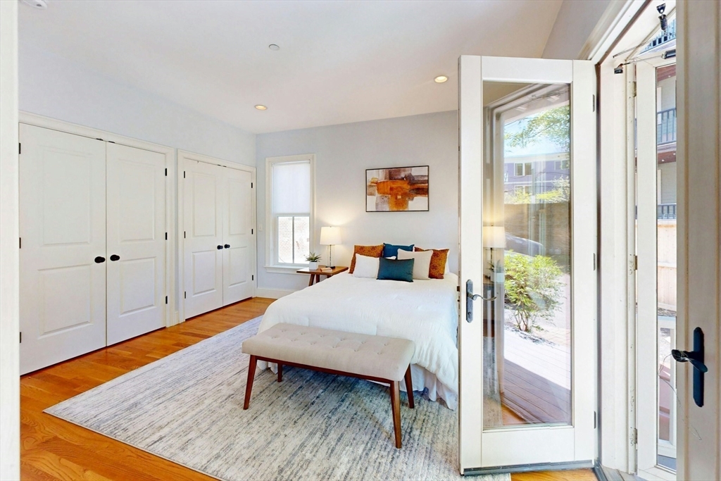 16 A Meehan Street, Unit 1 Boston, MA 02130 - Photo 9 of 16 a bed room with a bed and a window