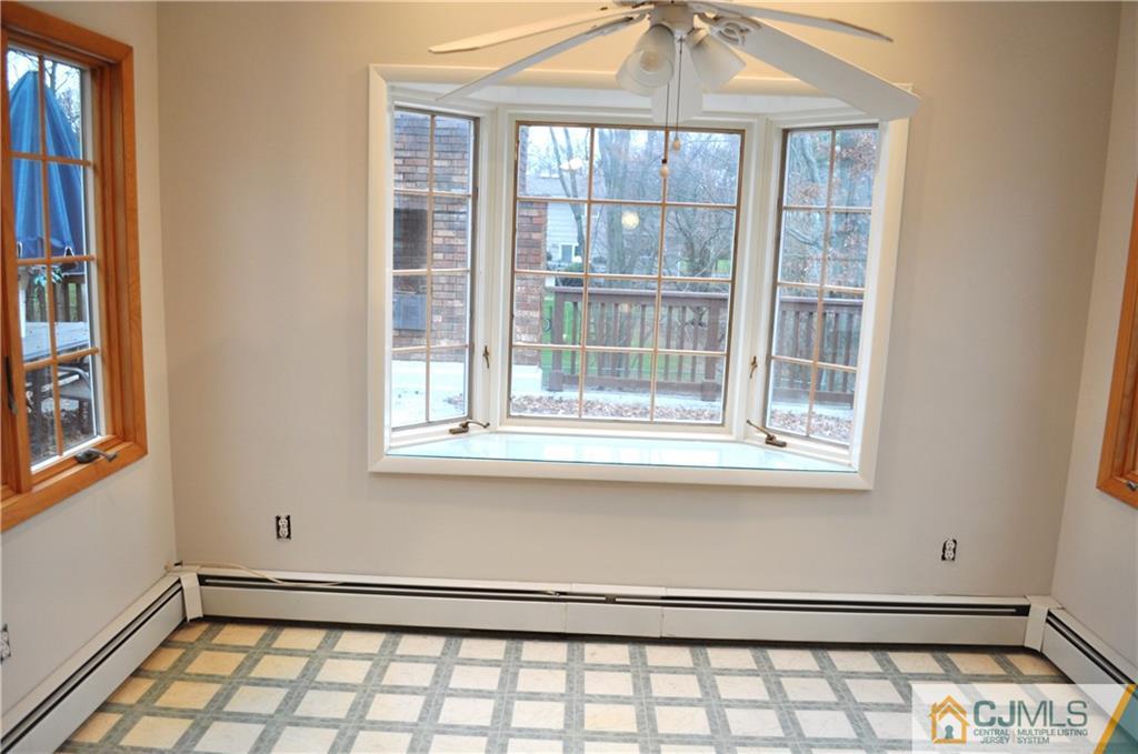 32 Nottingham Road Edison, NJ 08820 - Photo 14 of 25 a view of empty room with windows