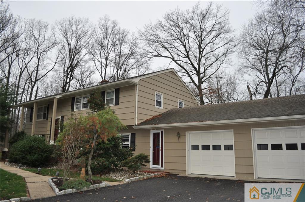 32 Nottingham Road Edison, NJ 08820 - Photo 3 of 25 a front view of a house with garden