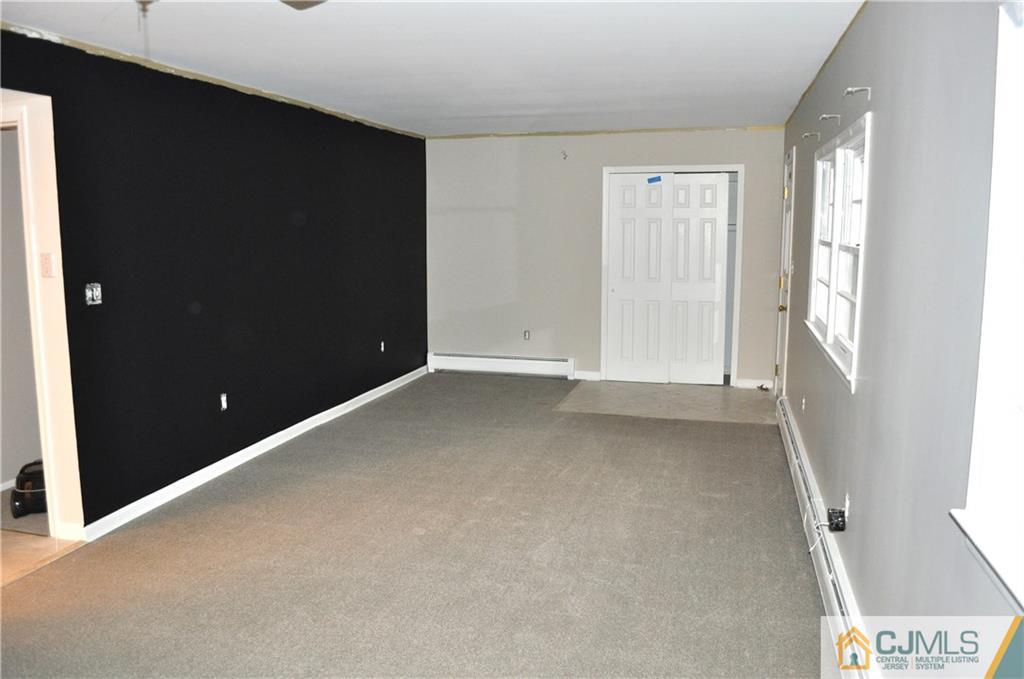 32 Nottingham Road Edison, NJ 08820 - Photo 25 of 25 an empty room with windows