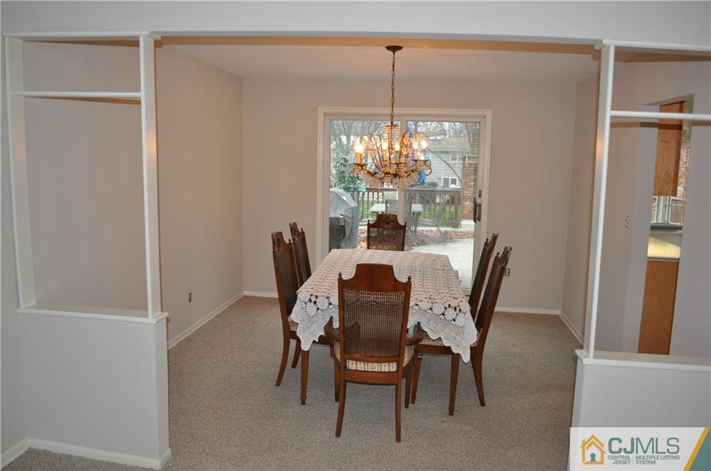 32 Nottingham Road Edison, NJ 08820 - Photo 9 of 25 a view of a dining room with furniture window and outside view