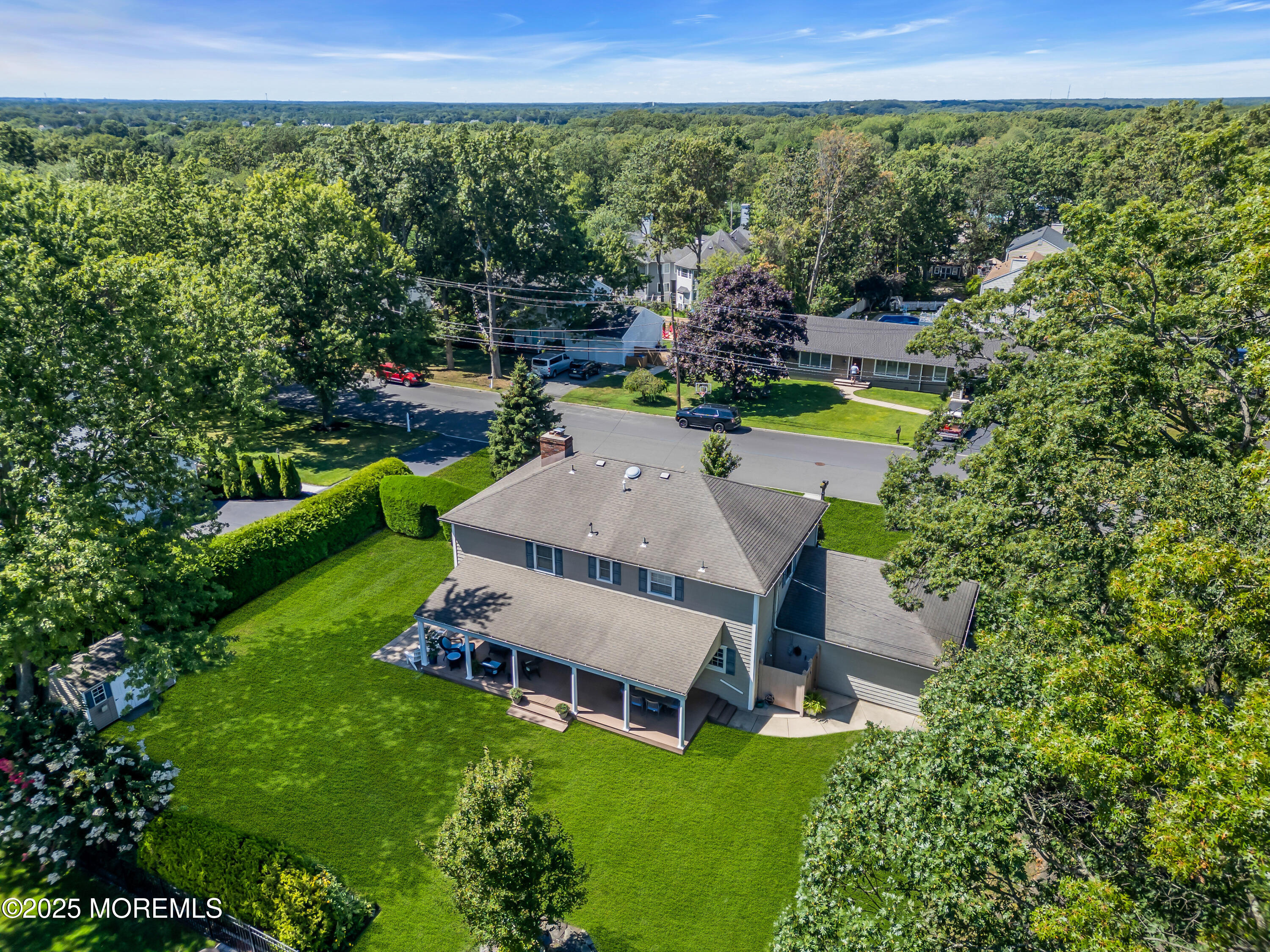 664 Valley Road Brielle, NJ 08730 - Photo 11 of 46 a aerial view of a house with garden