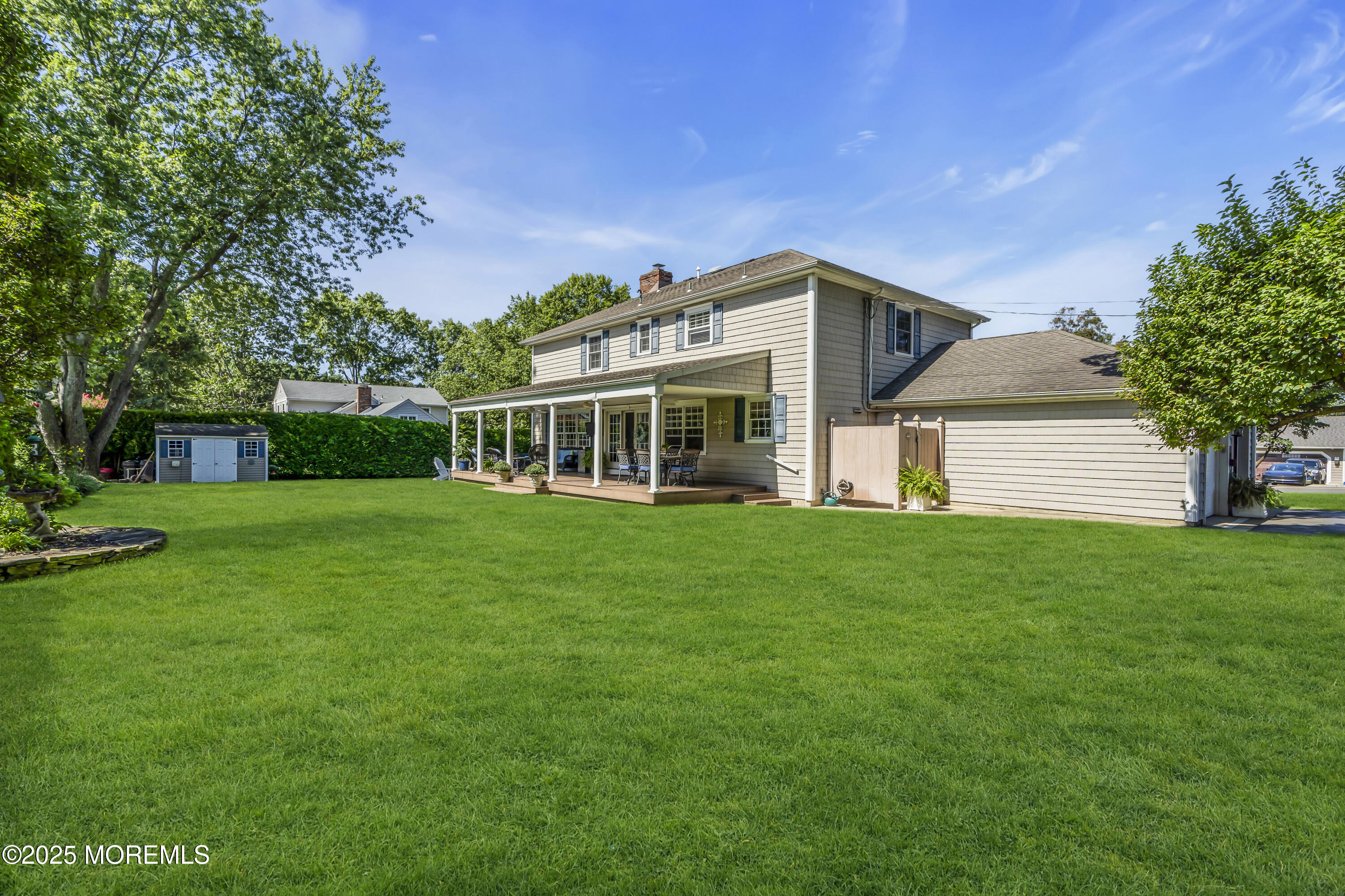 664 Valley Road Brielle, NJ 08730 - Photo 12 of 46 a front view of house with yard and green space