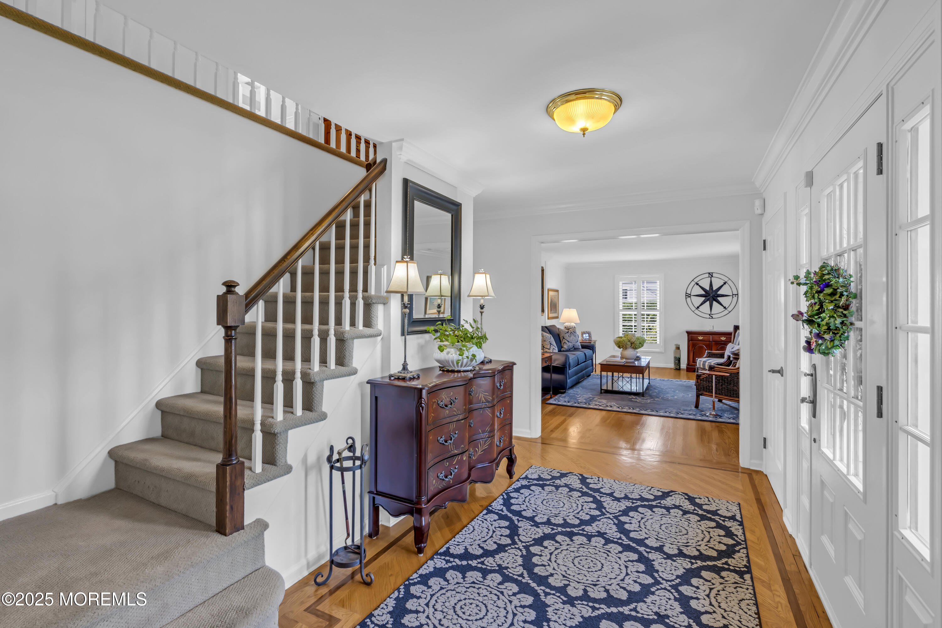 664 Valley Road Brielle, NJ 08730 - Photo 14 of 46 a living room with furniture and a rug
