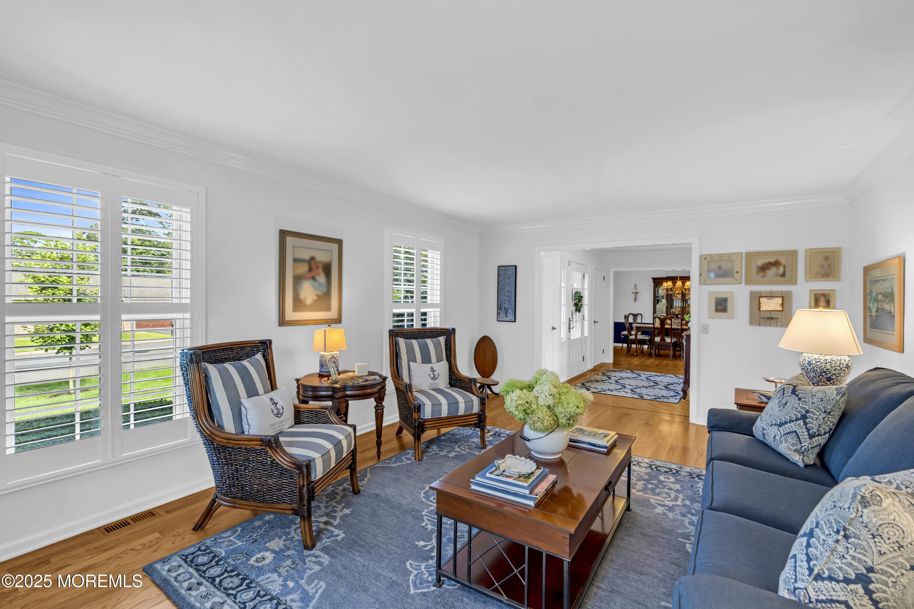664 Valley Road Brielle, NJ 08730 - Photo 15 of 46 a living room with furniture and a wooden floor