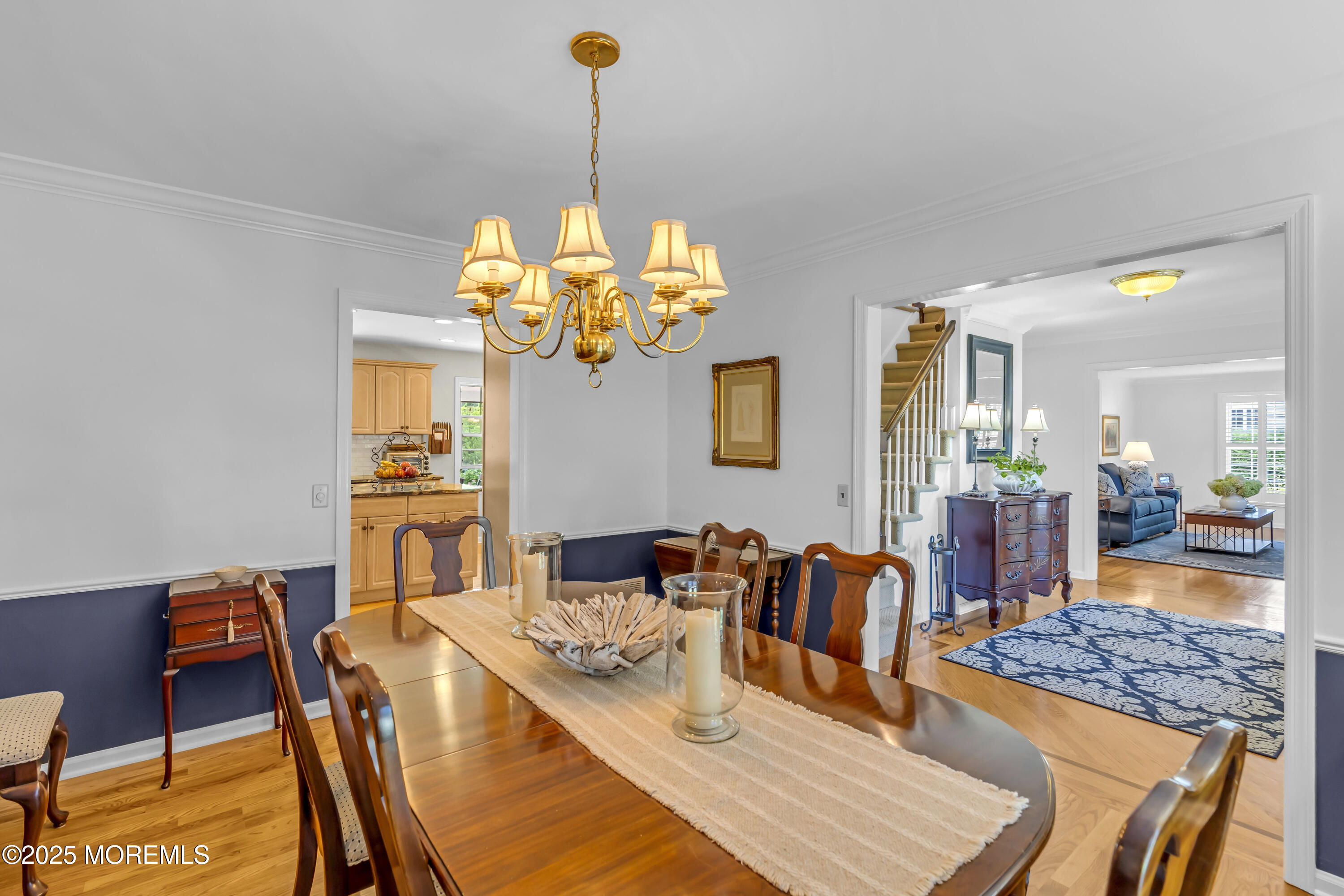 664 Valley Road Brielle, NJ 08730 - Photo 17 of 46 a view of a dining room with furniture and chandelier