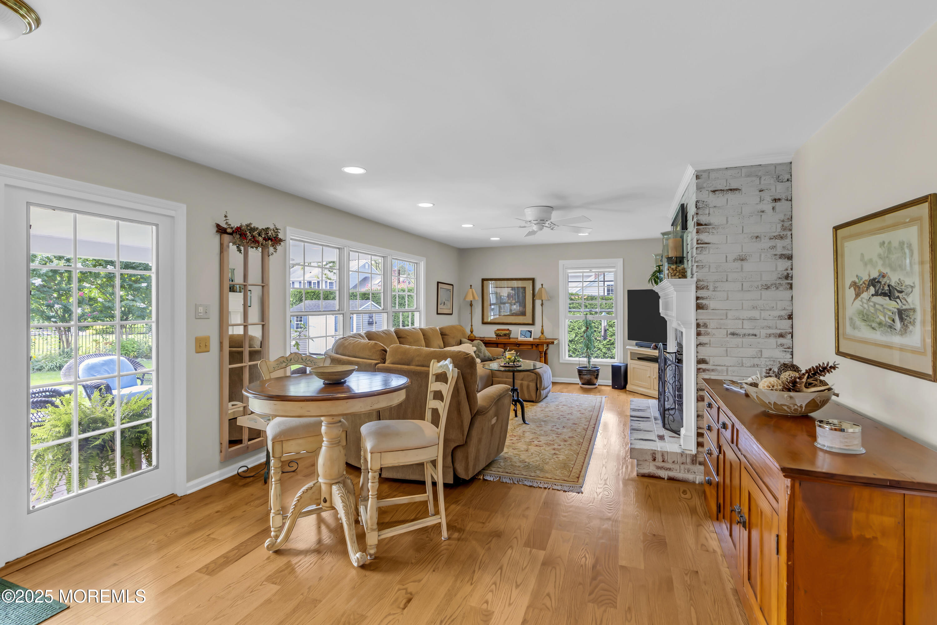 664 Valley Road Brielle, NJ 08730 - Photo 18 of 46 a dining room with furniture a rug and wooden floor