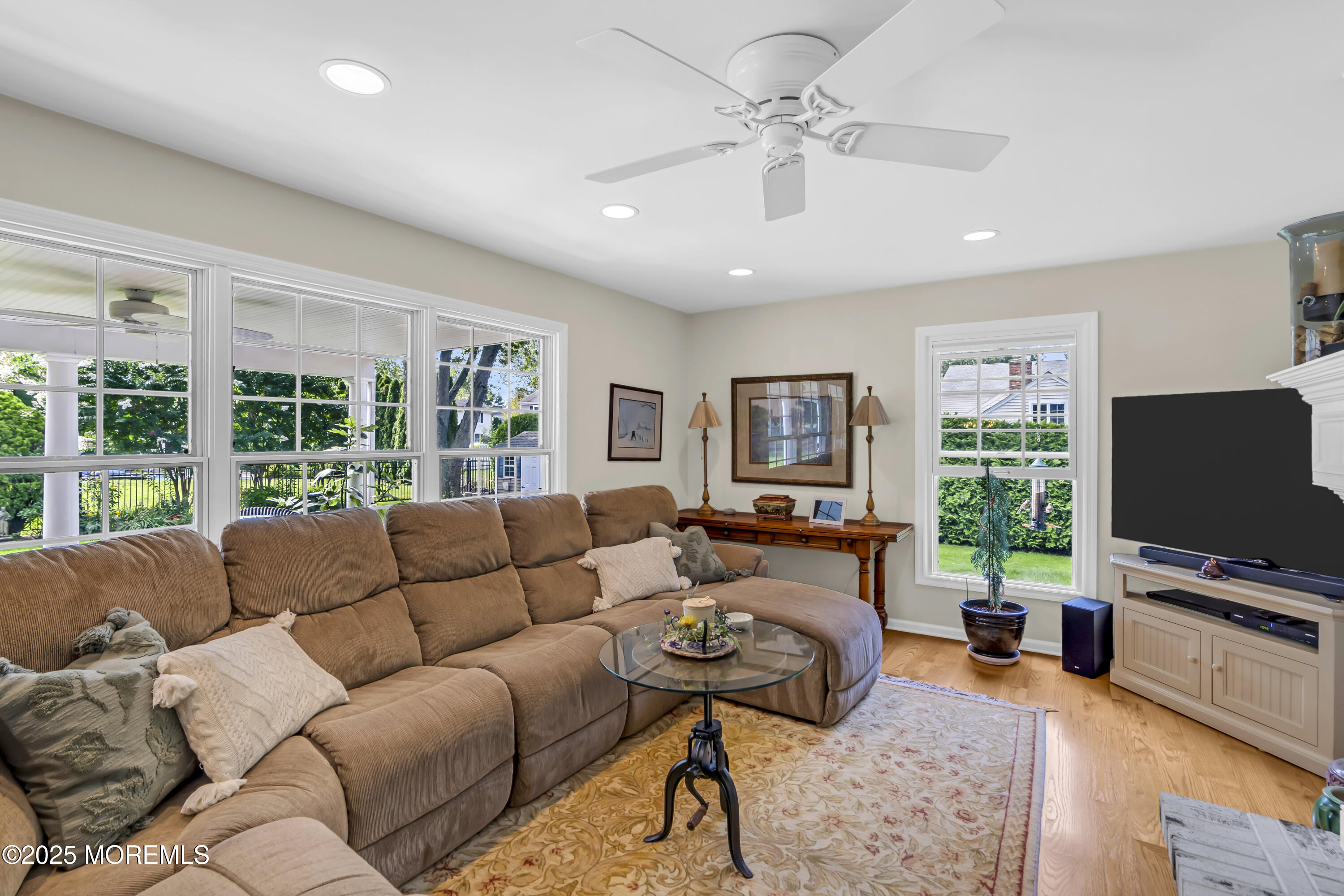 664 Valley Road Brielle, NJ 08730 - Photo 19 of 46 a living room with furniture and a flat screen tv