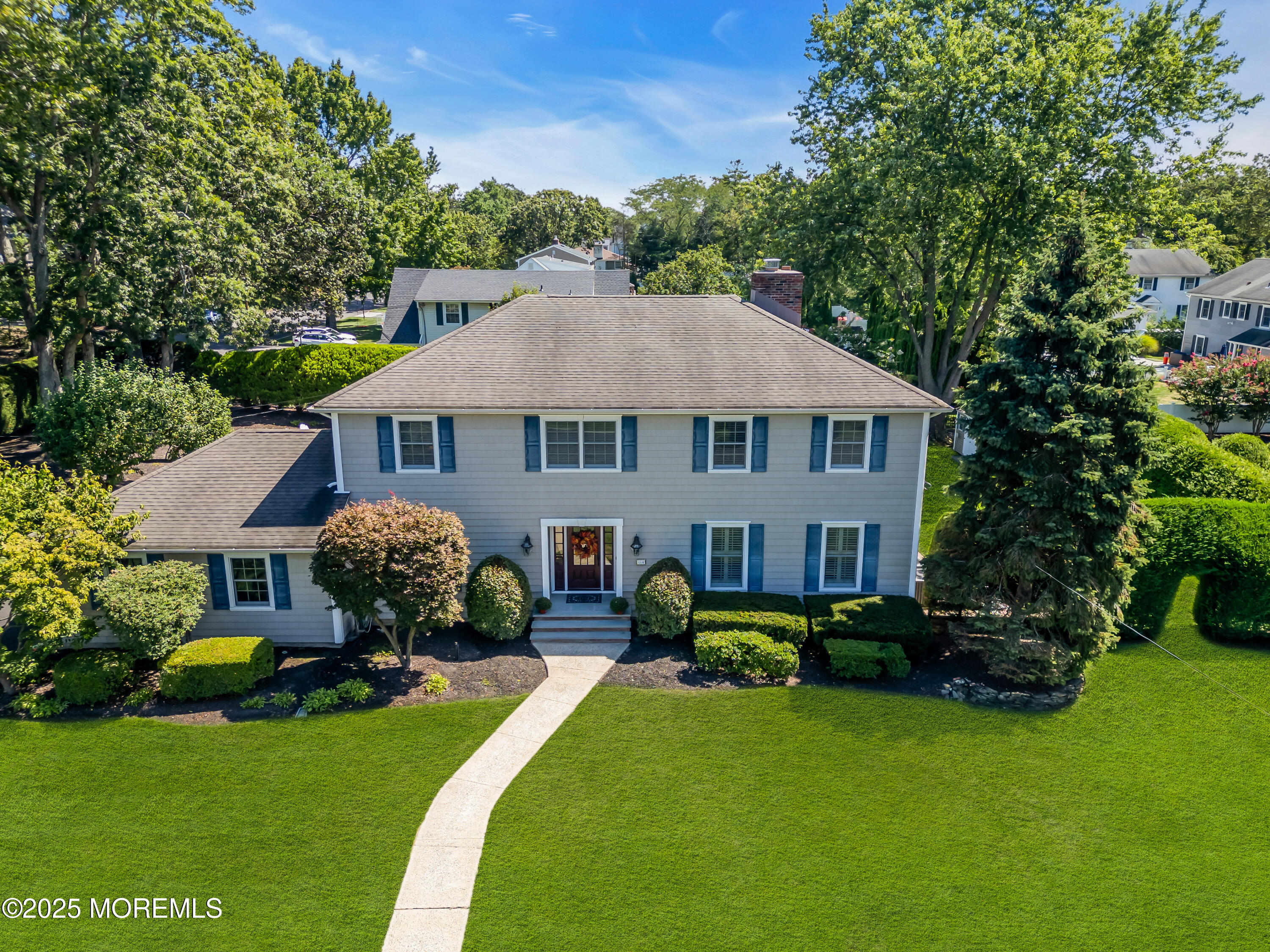 664 Valley Road Brielle, NJ 08730 - Photo 2 of 46 a house with garden in front of it