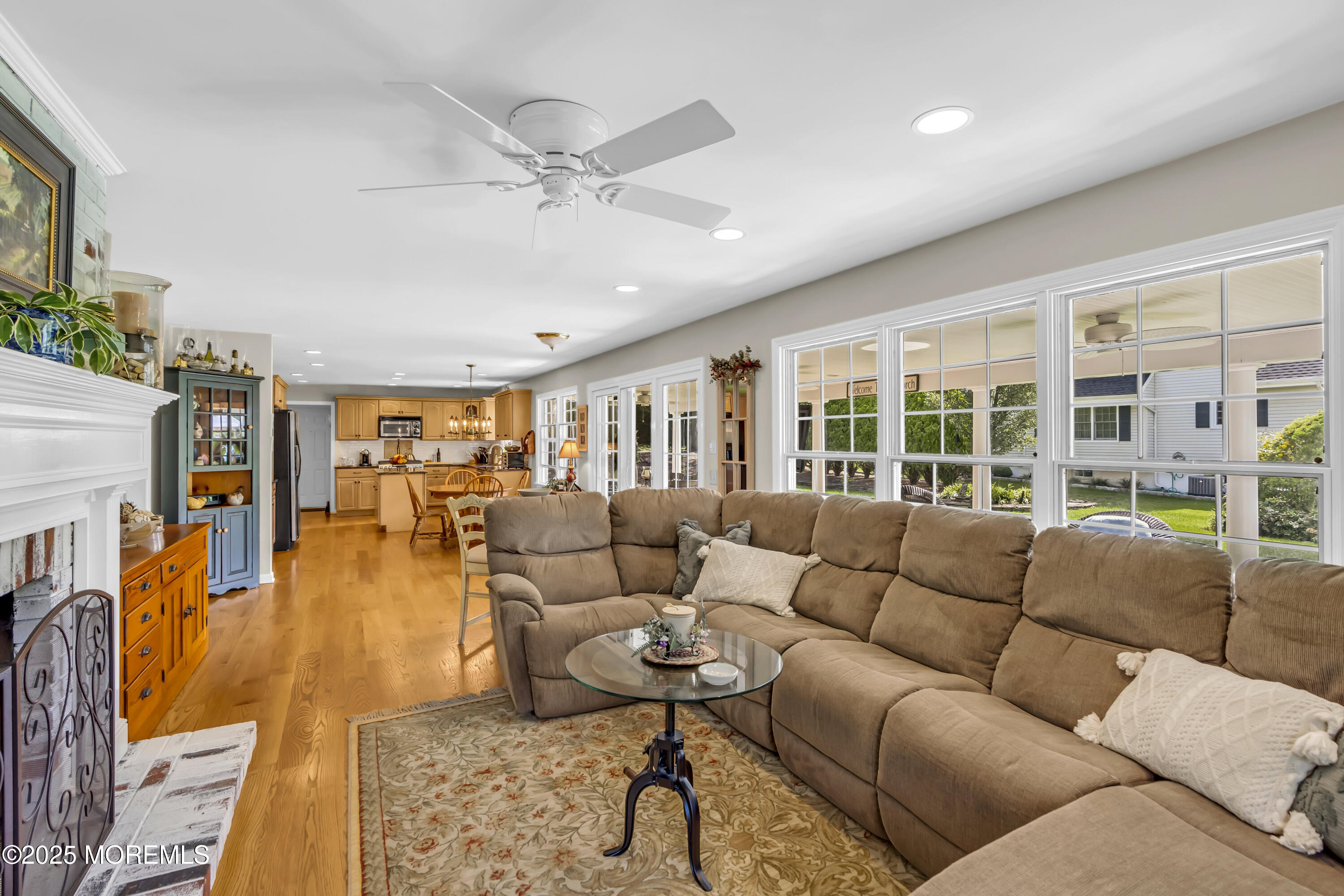664 Valley Road Brielle, NJ 08730 - Photo 22 of 46 a living room with furniture and a large window