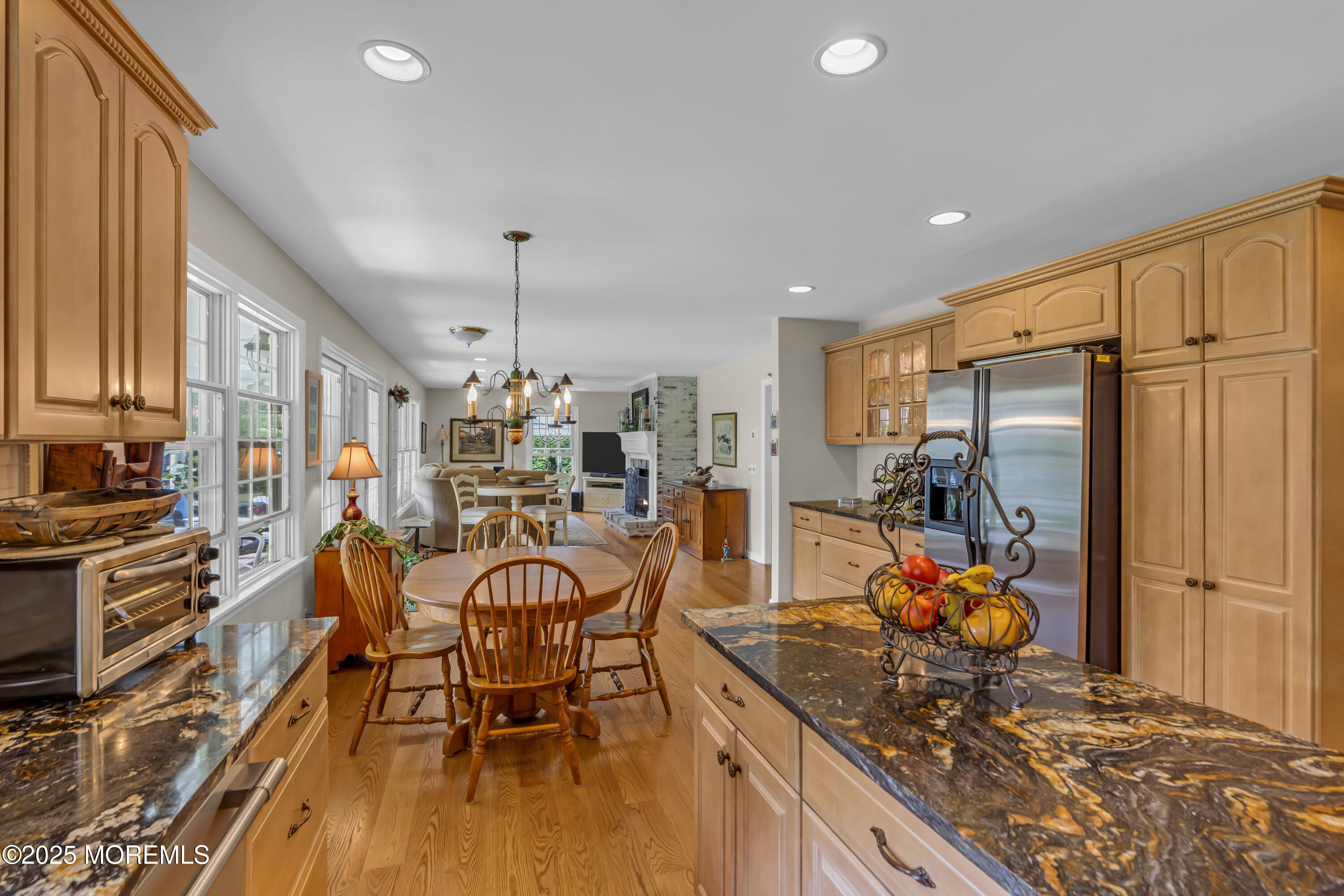 664 Valley Road Brielle, NJ 08730 - Photo 27 of 46 a dining room filled with furniture and a kitchen