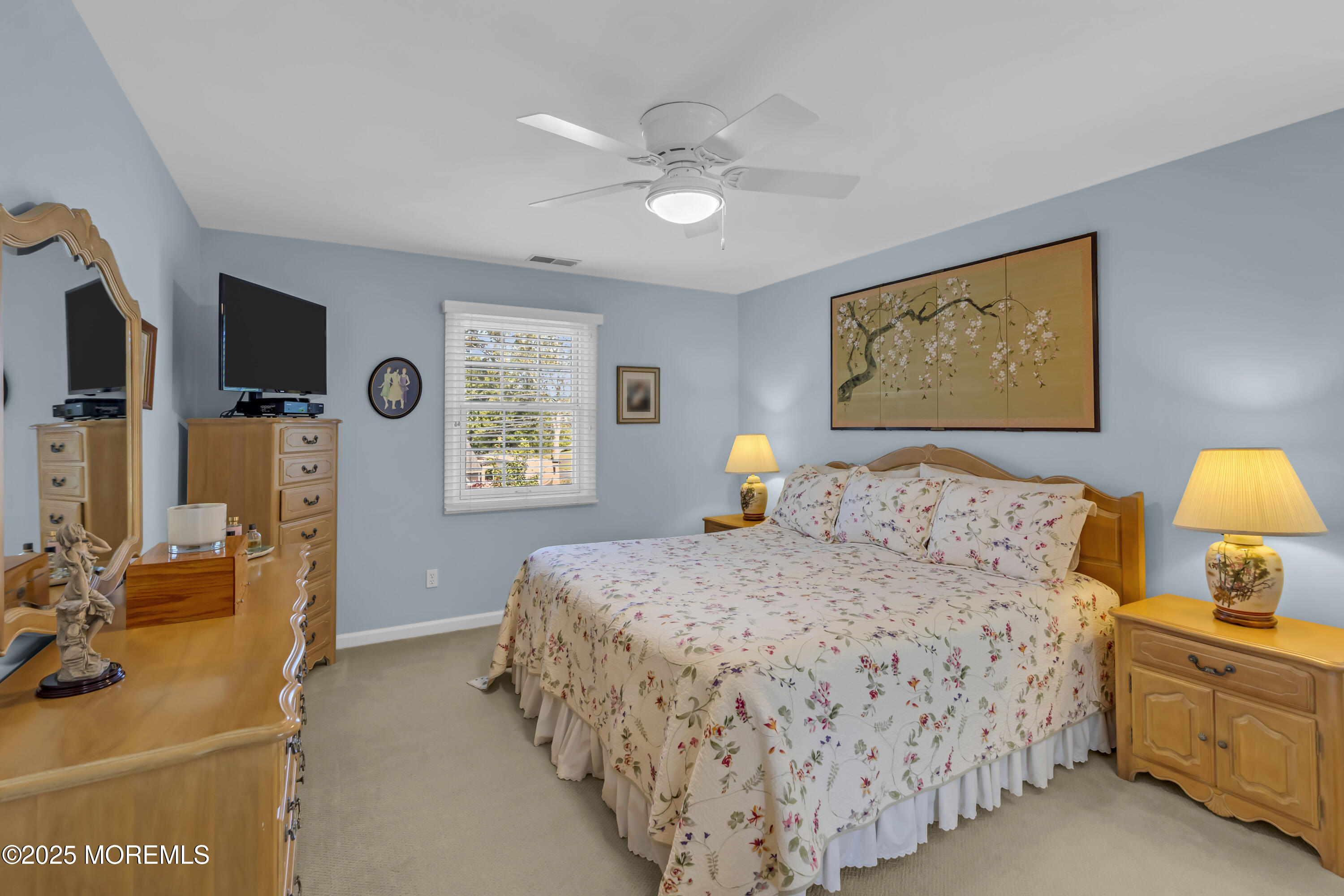 664 Valley Road Brielle, NJ 08730 - Photo 30 of 46 a bedroom with a bed and wooden floor