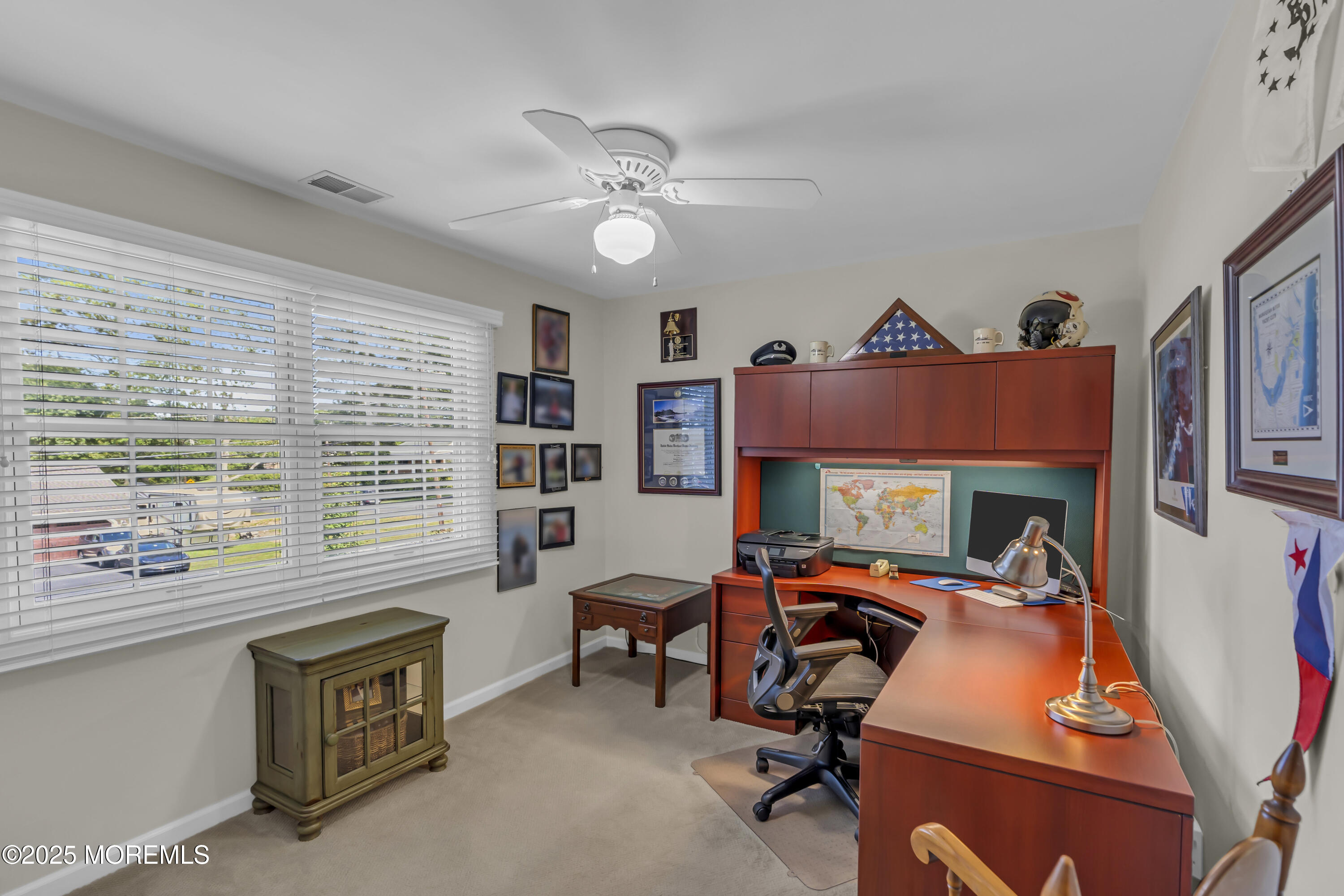 664 Valley Road Brielle, NJ 08730 - Photo 34 of 46 a view of a livingroom with furniture and a ceiling fan