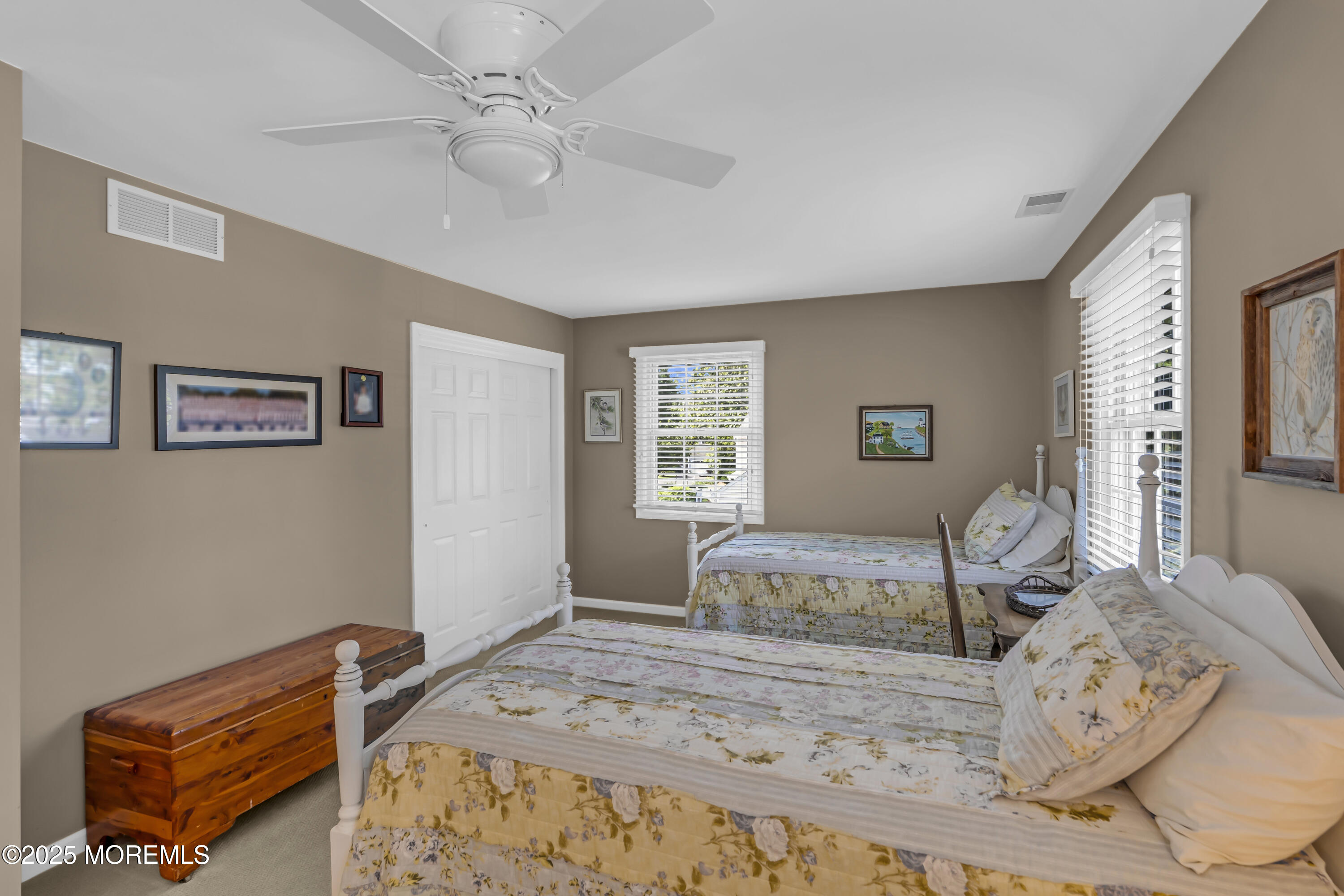 664 Valley Road Brielle, NJ 08730 - Photo 36 of 46 a bedroom with a bed and wooden floor