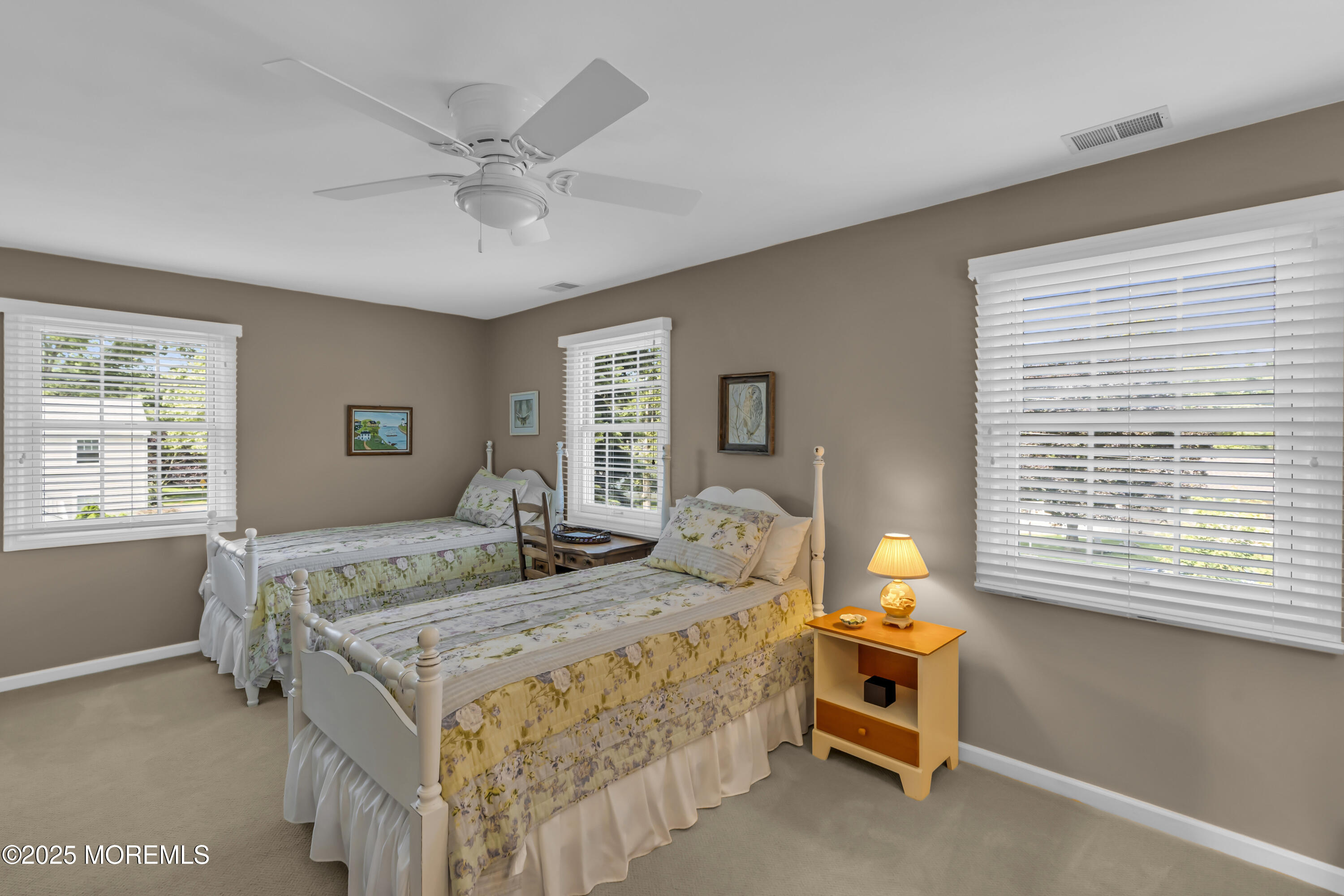 664 Valley Road Brielle, NJ 08730 - Photo 37 of 46 a bedroom with a bed and a window