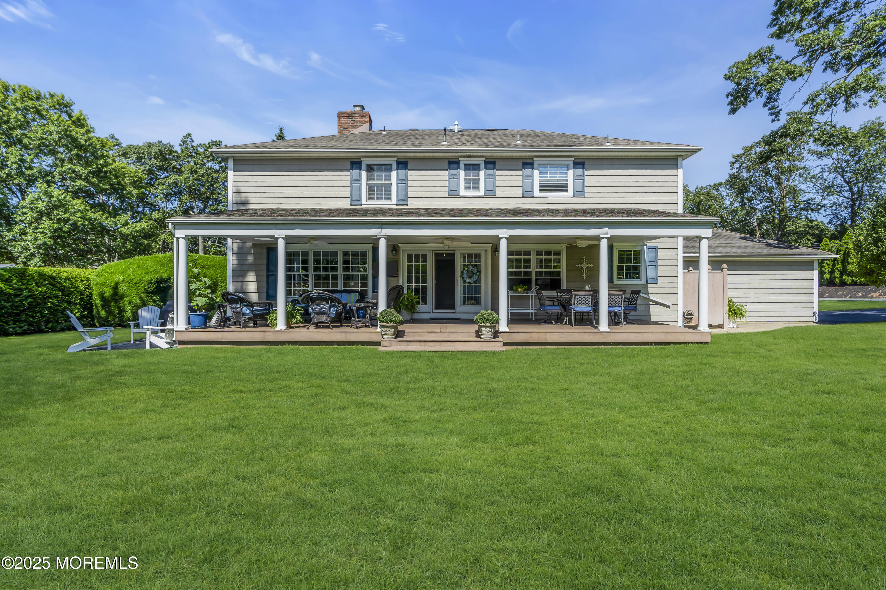 664 Valley Road Brielle, NJ 08730 - Photo 4 of 46 a front view of a house with a yard and green space