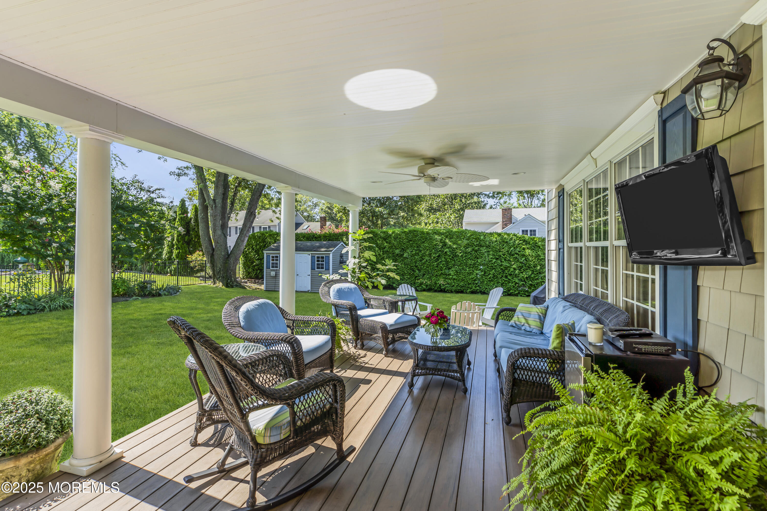 664 Valley Road Brielle, NJ 08730 - Photo 5 of 46 a view of a livingroom with furniture and garden