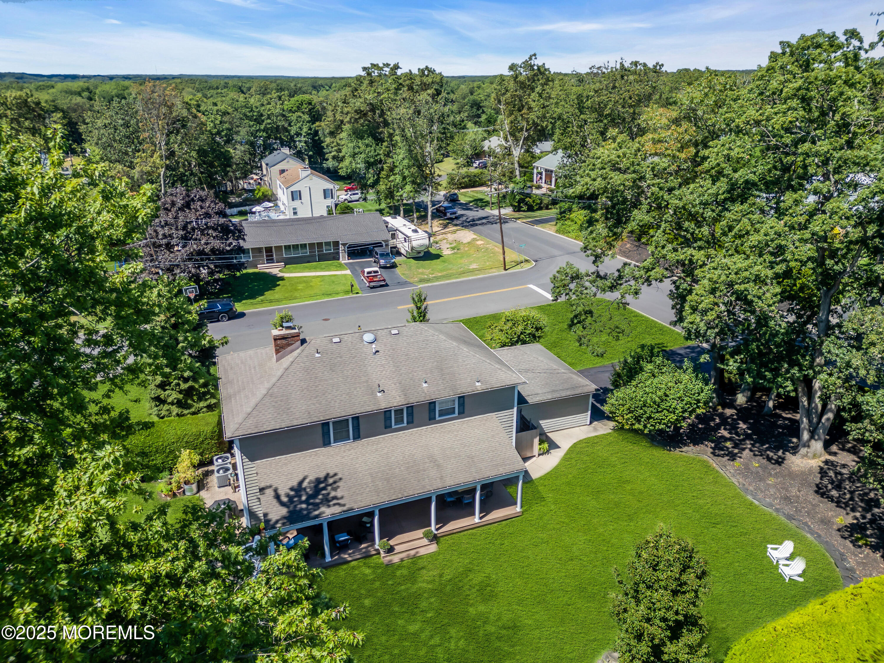 664 Valley Road Brielle, NJ 08730 - Photo 6 of 46 an aerial view of a house with a garden