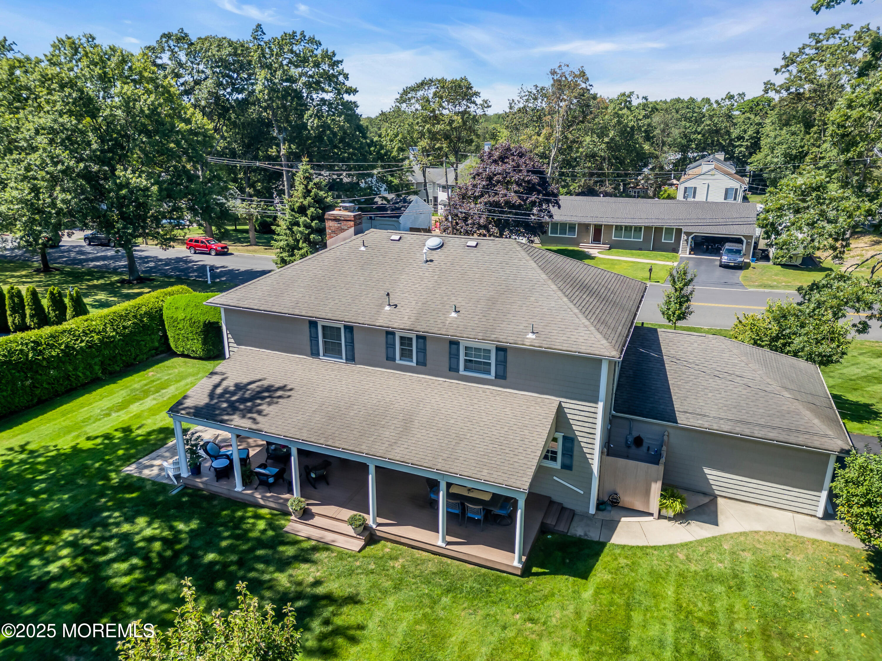664 Valley Road Brielle, NJ 08730 - Photo 7 of 46 an aerial view of a house with garden space and sitting area