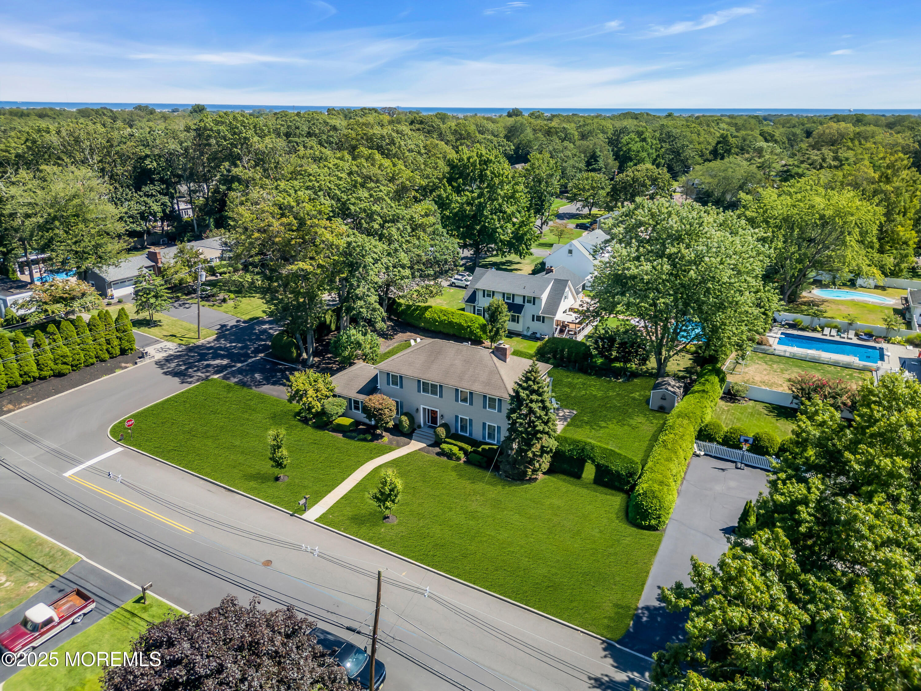 664 Valley Road Brielle, NJ 08730 - Photo 8 of 46 an aerial view of a house with a garden