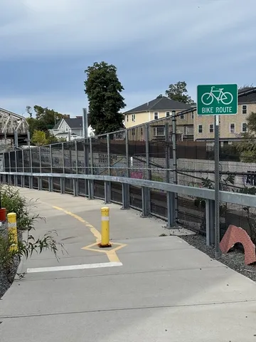 a view of brick building with a street light