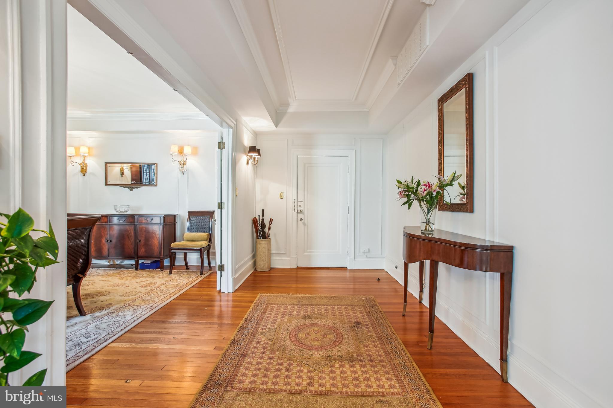 1661 Crescent Place Northwest, Unit 408 Washington, DC 20009 - Photo 4 of 57 Hall Gallery with Tray Ceiling & Crown Molding