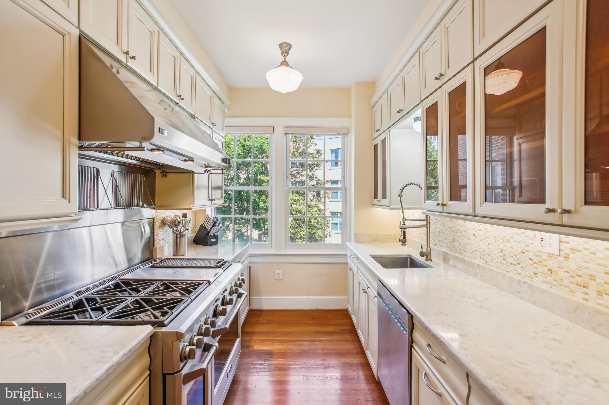 1661 Crescent Place Northwest, Unit 408 Washington, DC 20009 - Photo 6 of 57 GE Monogram Professional Grade Gas Range