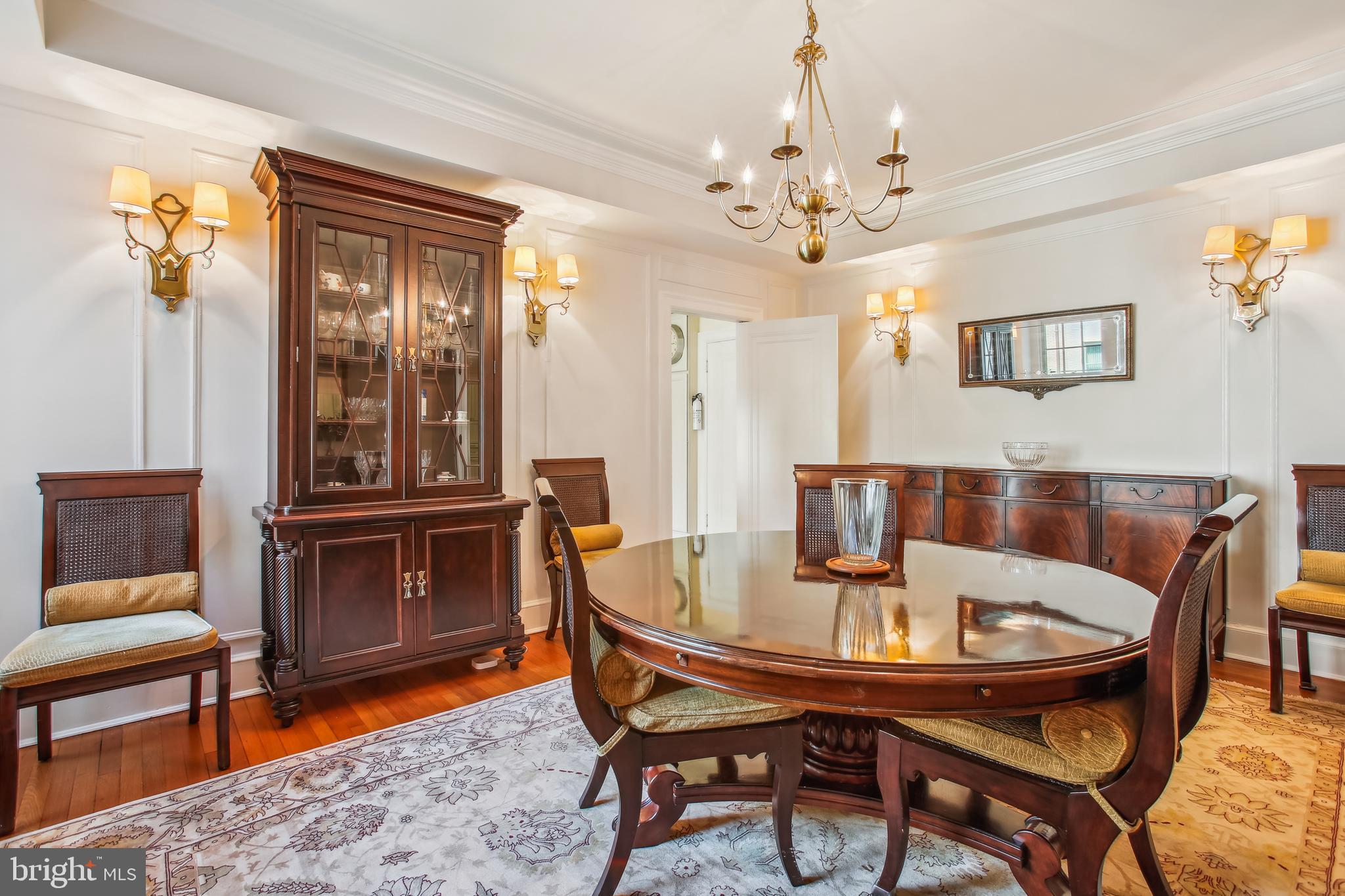 1661 Crescent Place Northwest, Unit 408 Washington, DC 20009 - Photo 9 of 57 Formal Dining Room with Vintage Brass Sconces