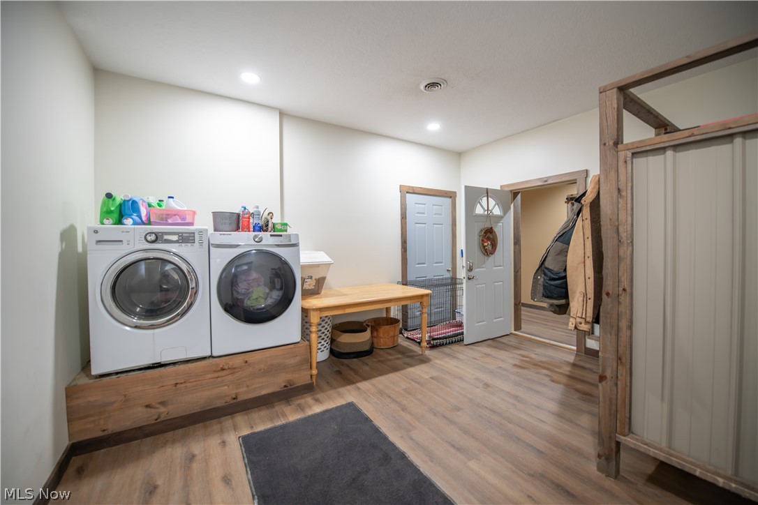 9918 Ridge Road Southeast Uhrichsville, OH 44683 - Photo 16 of 42 First Floor Laundry with Half Bath
