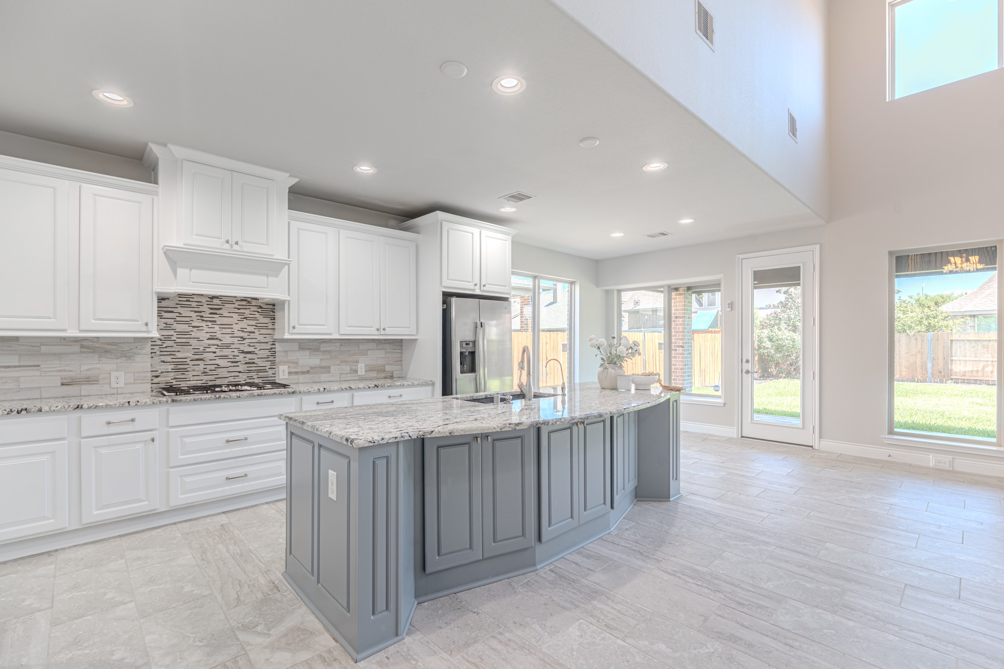 27918 Madison Bend Drive Spring, TX 77386 - Photo 19 of 50 a kitchen with stainless steel appliances granite countertop a sink and cabinets