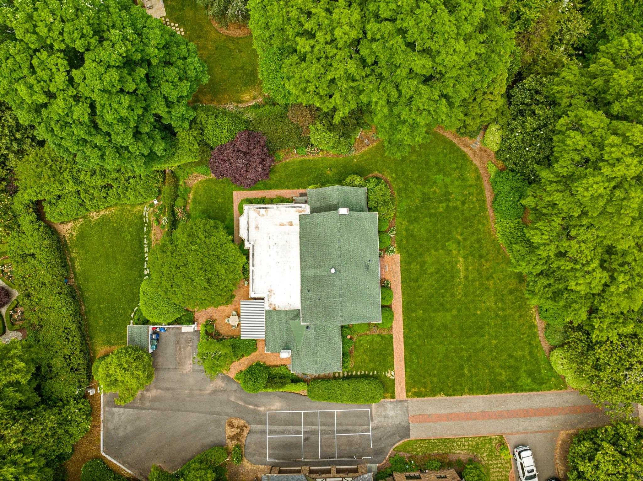 2217 St Marys Street Raleigh, NC 27608 - Photo 52 of 52 2217 St. Mary's Street sits on 0.88 acres of land including a spacious front yard, back patio, and further back yard area. Well maintained and cared for. You will not find this kind of acerage on St. Mary's Street elsewhere! Aerial View of the Home