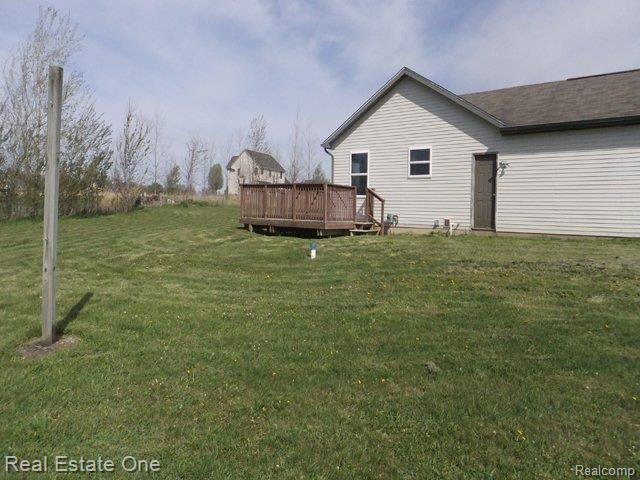 8581 Bergin Road Howell, MI 48843 - Photo 25 of 25 261-813145 Side V iew.jpg