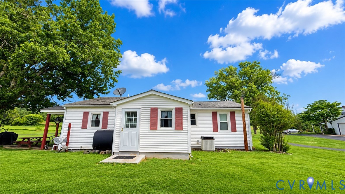 5560 West Hoover Road Reva, VA 22735 - Photo 7 of 32 White siding exterior featuring red louvered shutt