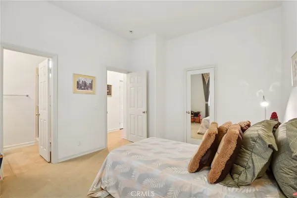 a bed room with a bed and a couch