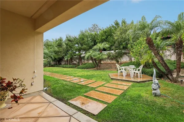 a garden view with a seating space