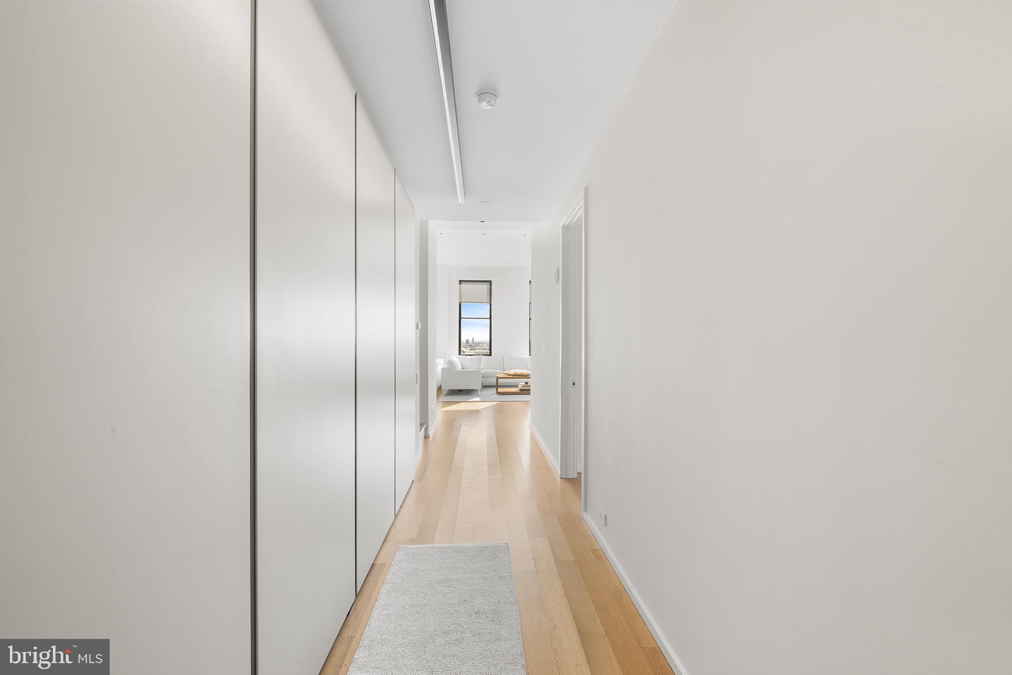 210 West Washington Square, Unit 6SW Philadelphia, PA 19106 - Photo 5 of 40 a view of a hallway with a white walls