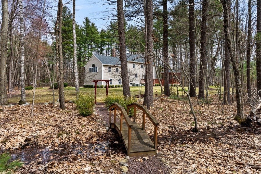 628 Boston Road Groton, MA 01450 - Photo 28 of 32 a view of a park with large trees