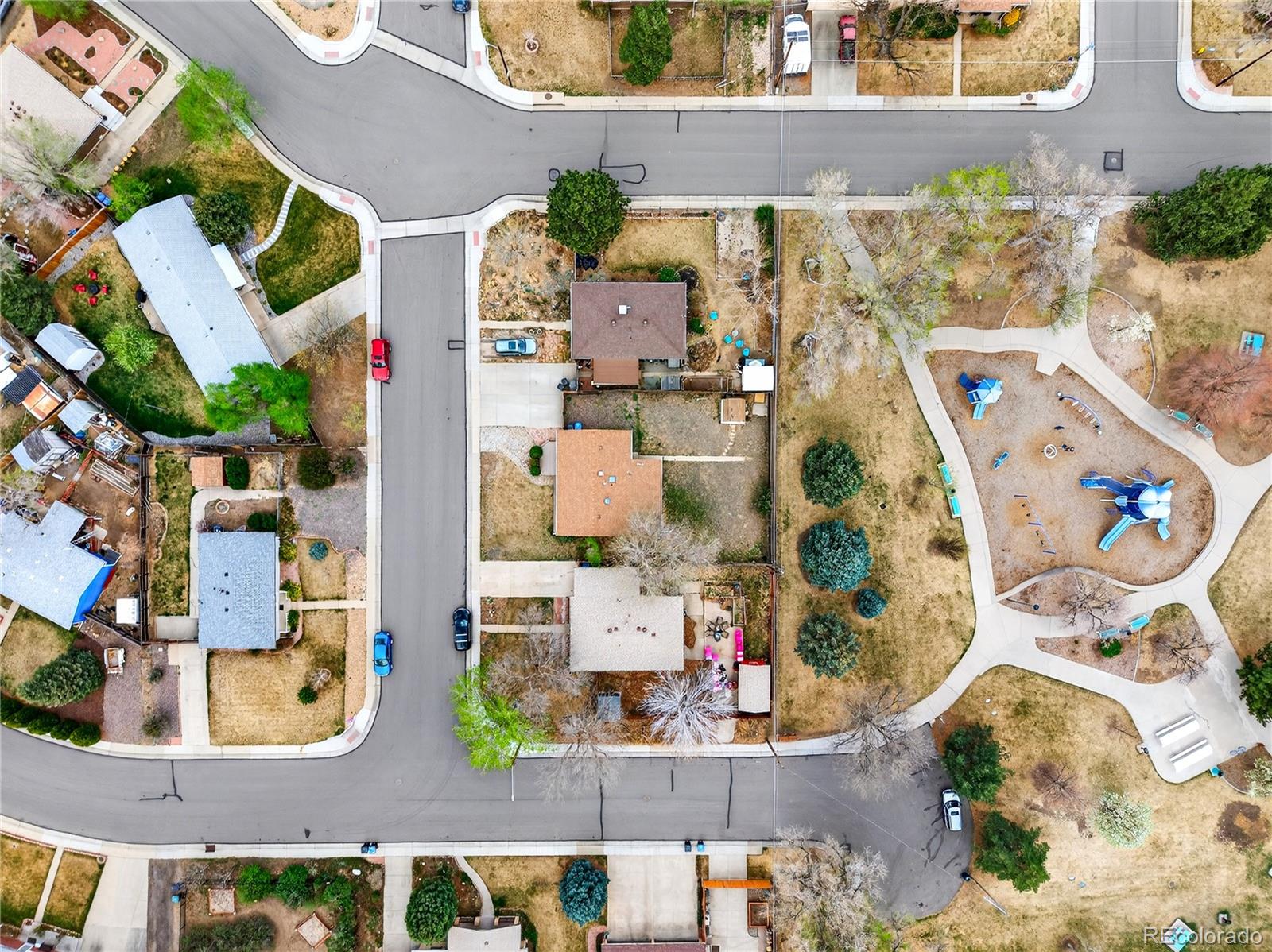 5246 Pierce Street Arvada, CO 80002 - Photo 13 of 30 an aerial view of multiple houses with outdoor space