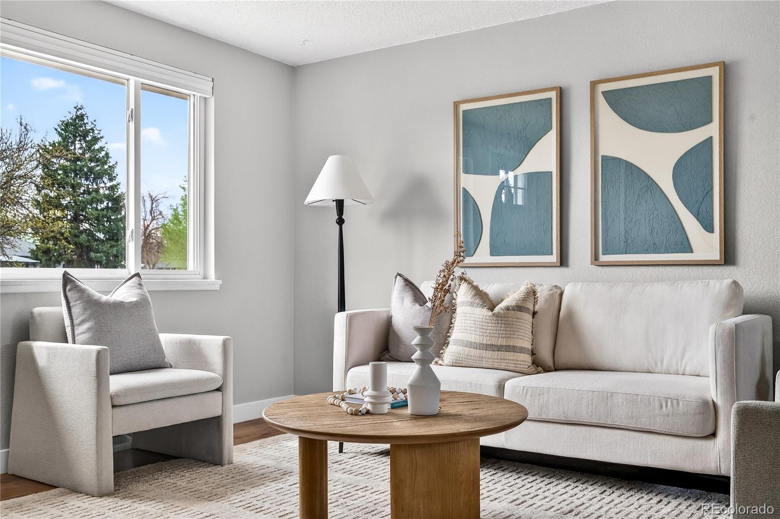 5246 Pierce Street Arvada, CO 80002 - Photo 5 of 30 a living room with furniture and a window