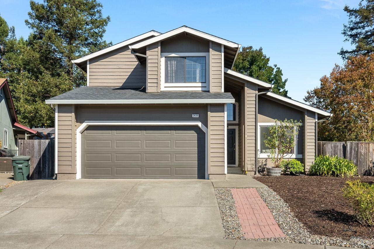 2439 Pinercrest Drive Santa Rosa, CA 95403 - Photo 1 of 1 a front view of a house with garden