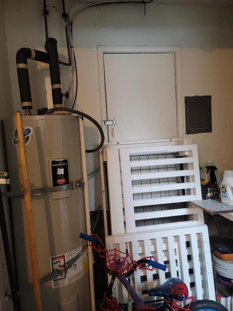 947 Ridgeview Court, Unit C South San Francisco, CA 94080 - Photo 22 of 26 a view of a room with rack and furniture