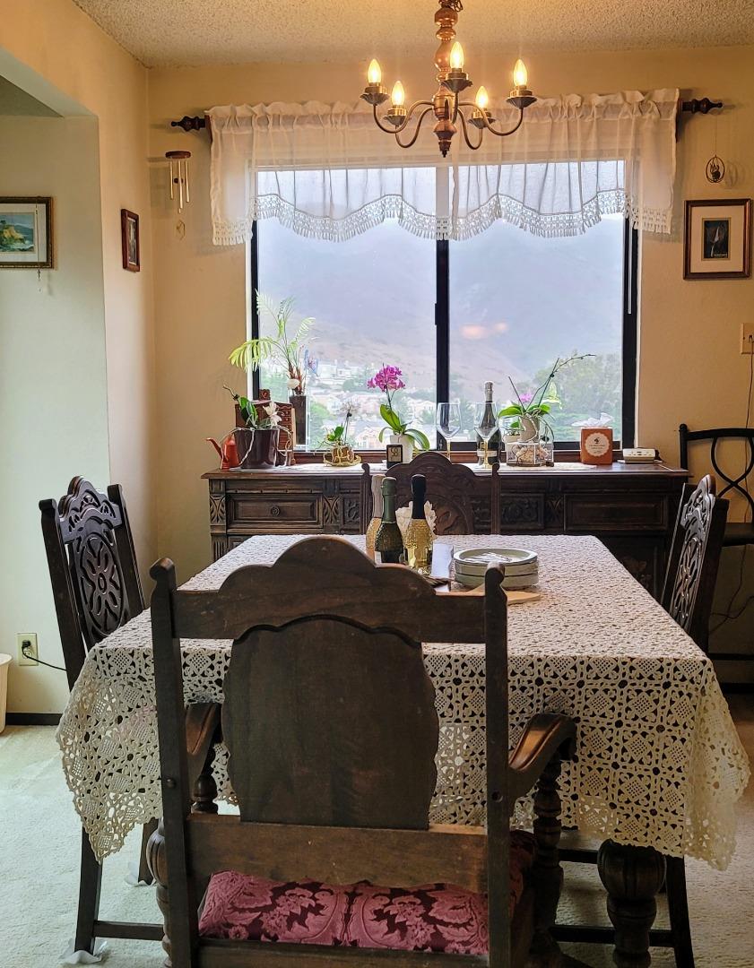 947 Ridgeview Court, Unit C South San Francisco, CA 94080 - Photo 5 of 26 a dining room with furniture and a large window
