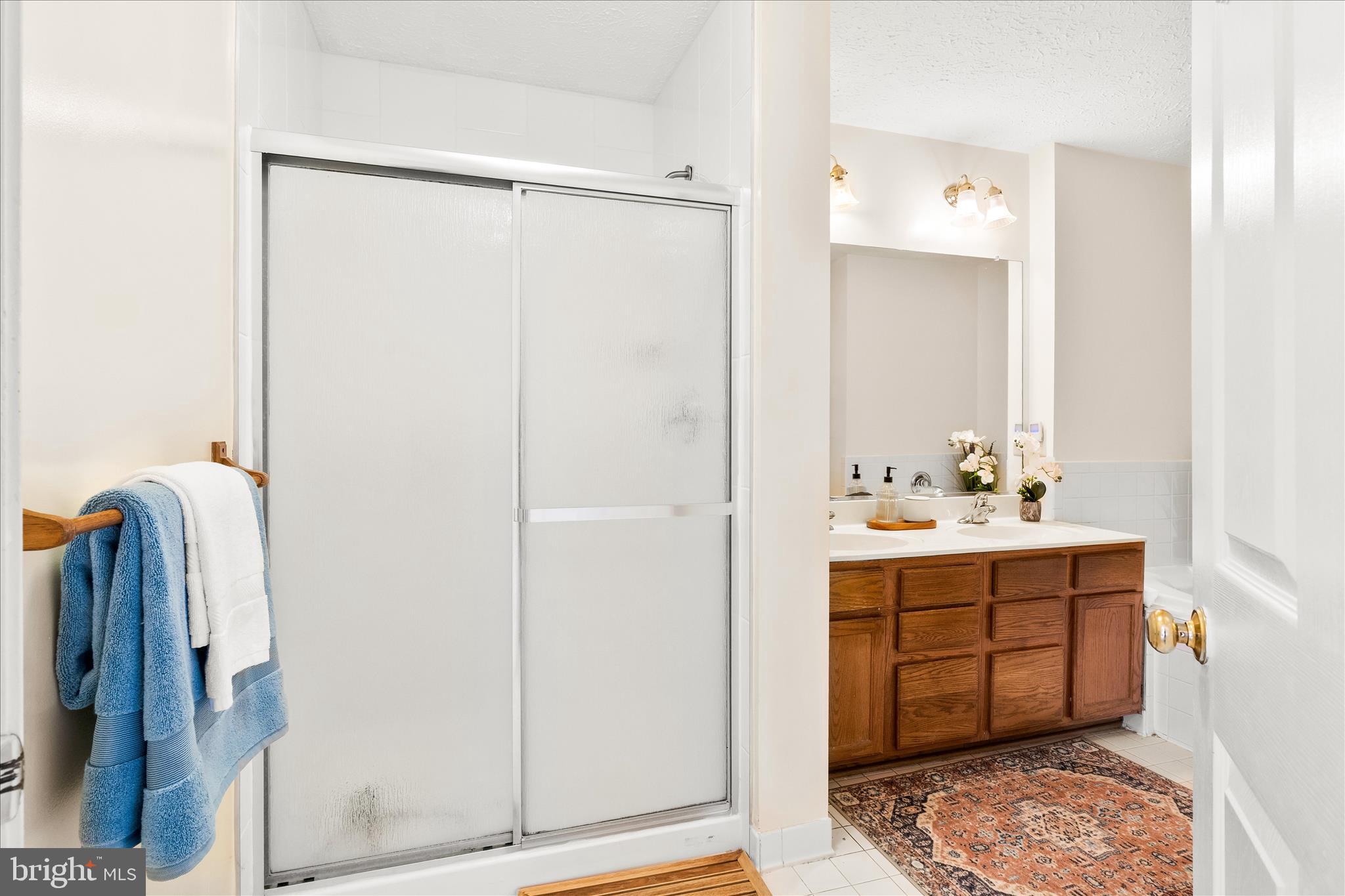 5306 Regal Court Frederick, MD 21703 - Photo 11 of 17 a bathroom with a sink and a mirror