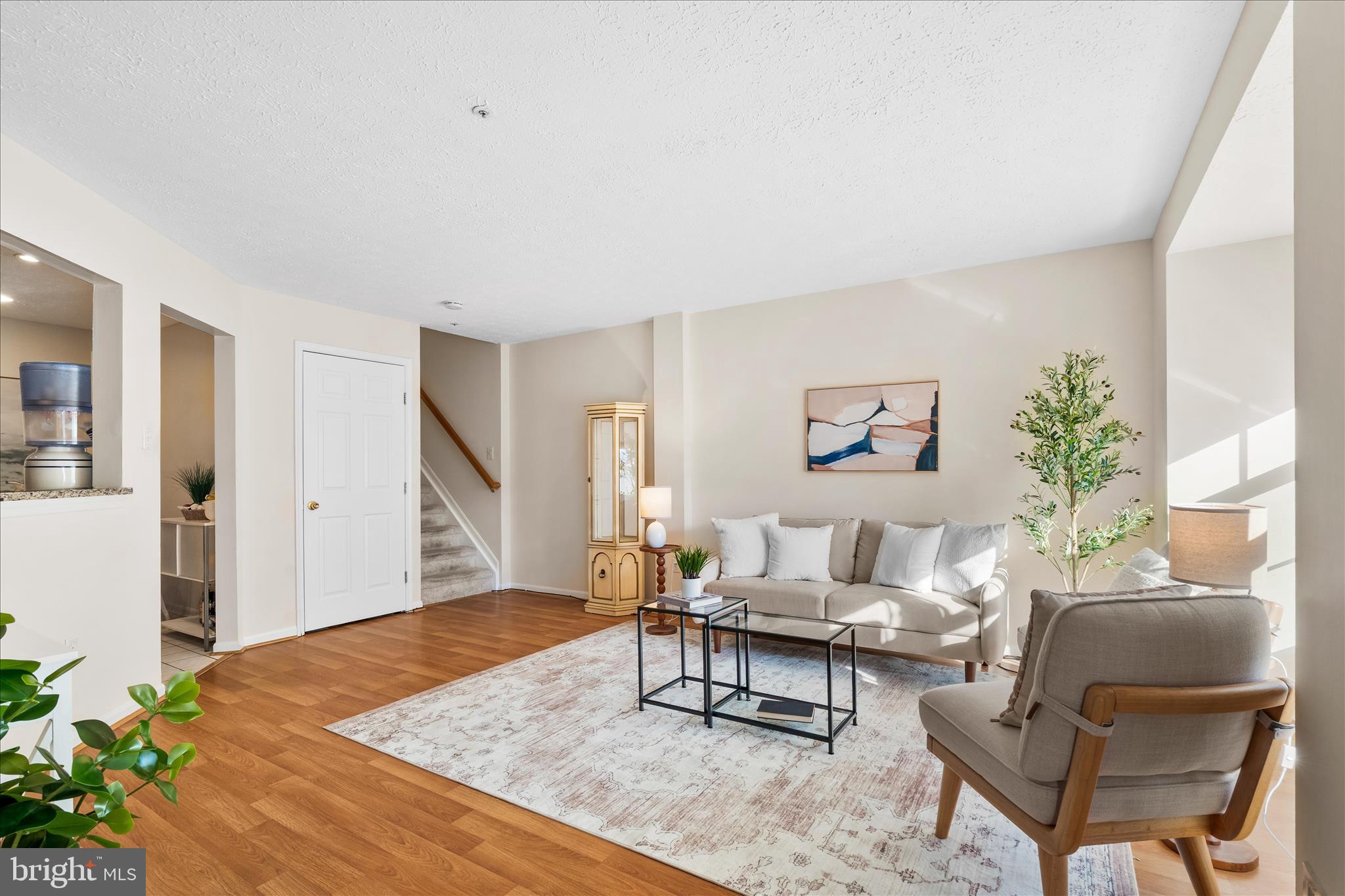 5306 Regal Court Frederick, MD 21703 - Photo 3 of 17 a living room with furniture and wooden floor
