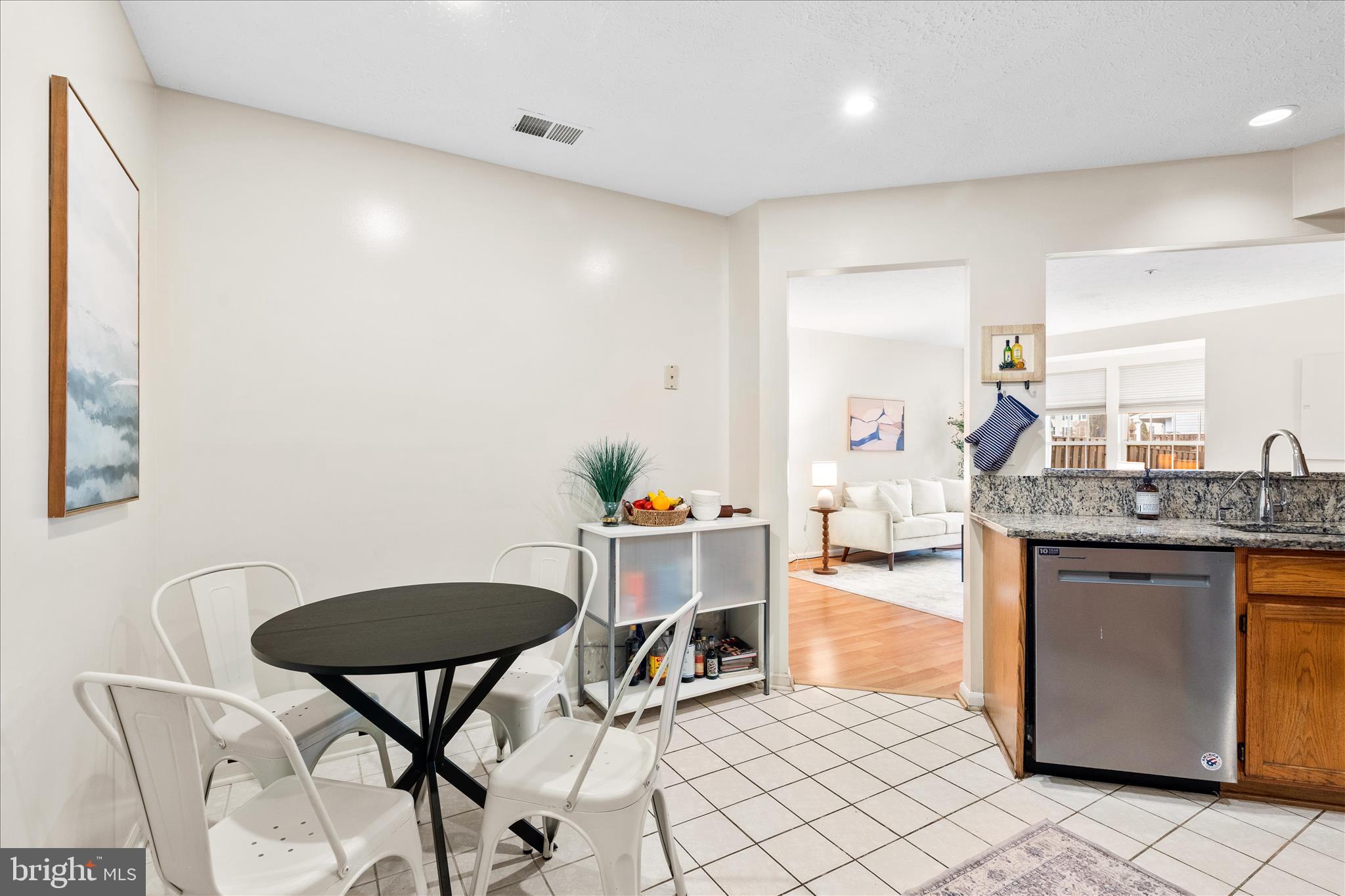 5306 Regal Court Frederick, MD 21703 - Photo 7 of 17 a living room with furniture and a table