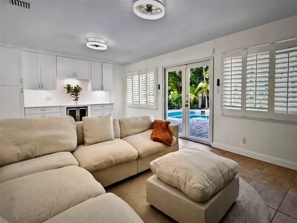a living room with furniture and a window